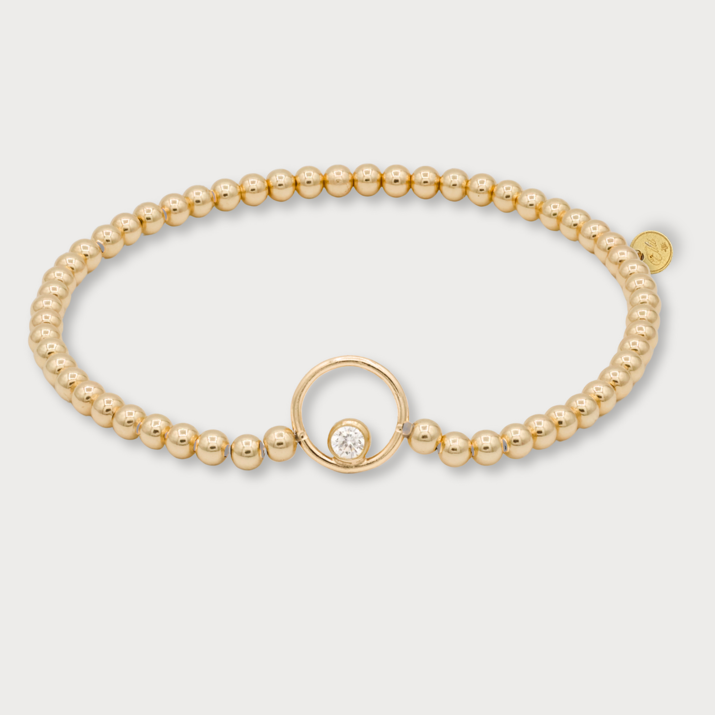 Aimée - goldfilled armband met cirkel met zirkonia