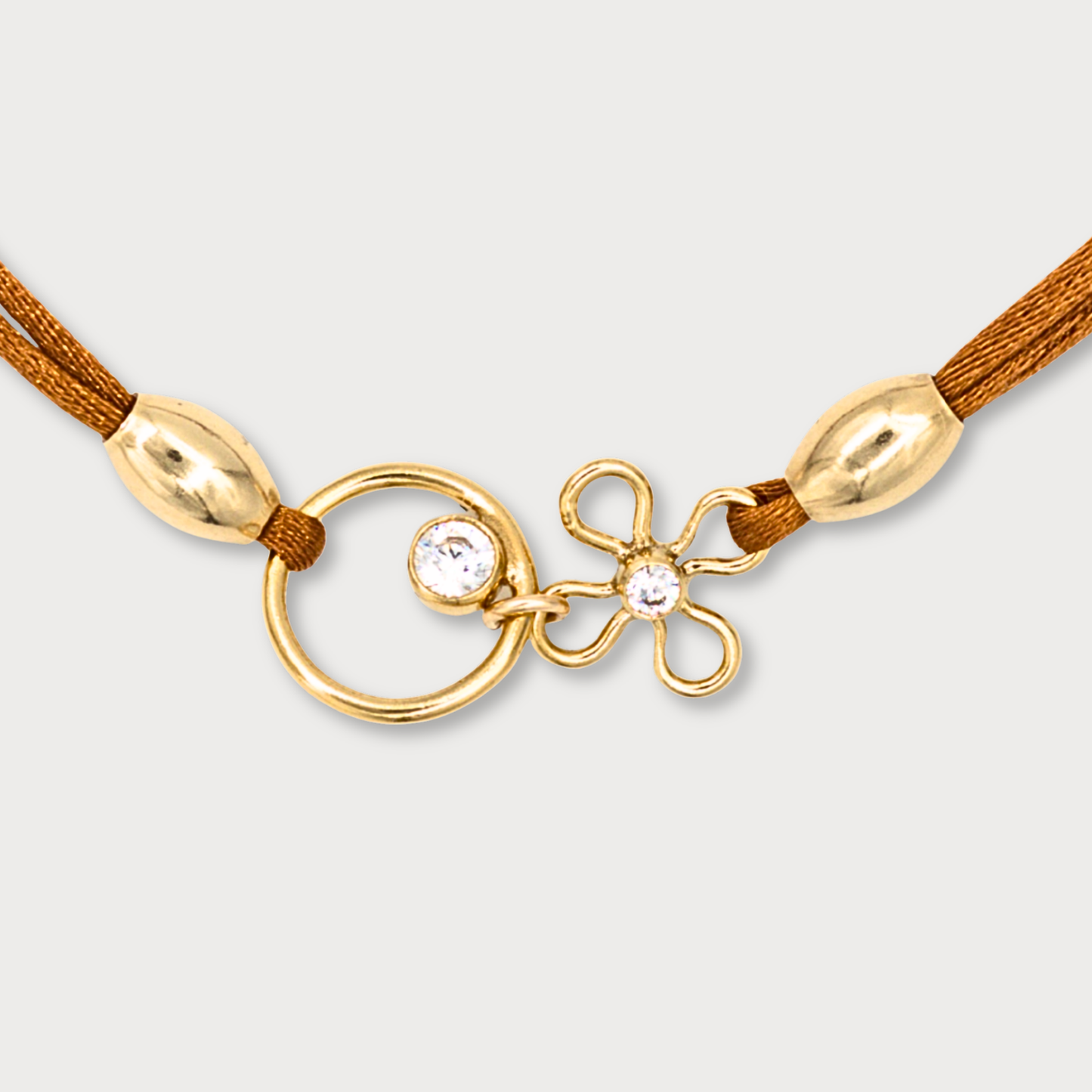 Aimée - goldfilled armband met bloem en cirkel met zirkonia
