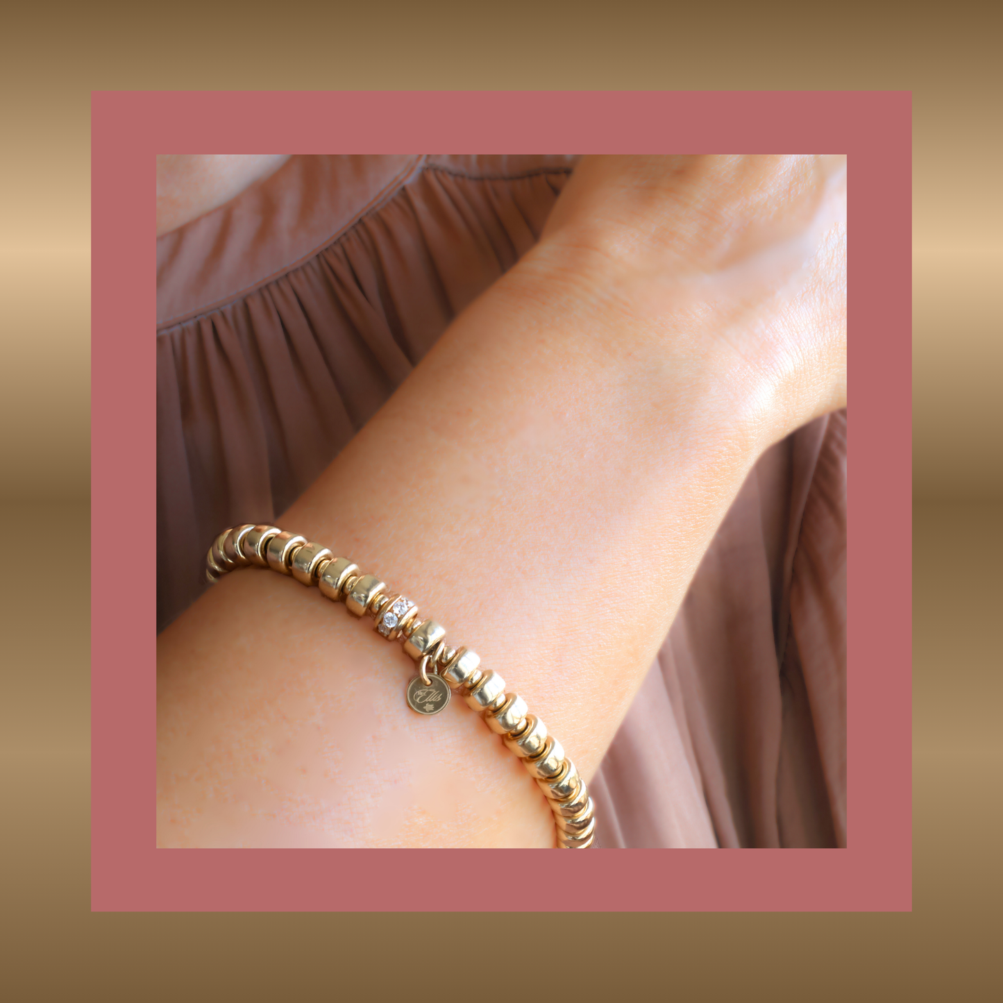 Exclusives - goldfilled armband met elementen in de vorm van wieltjes en zirkonia