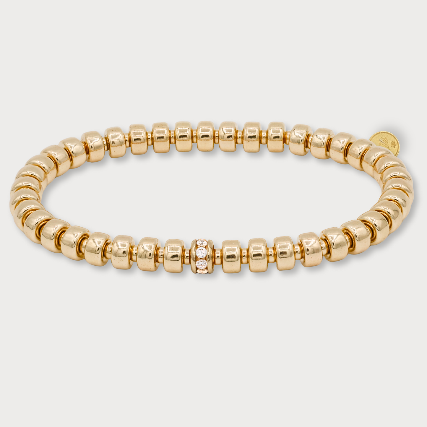 Exclusives - goldfilled armband met elementen in de vorm van wieltjes en zirkonia