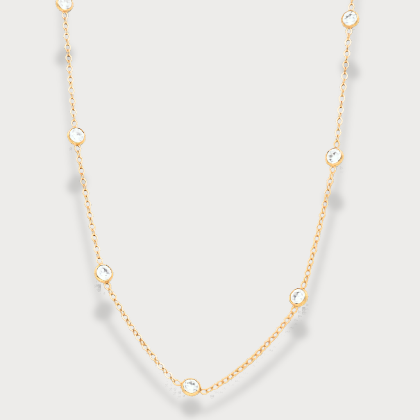 Exclusives - Goldfilled collier met 9 zirkonia's in een ronde zetting