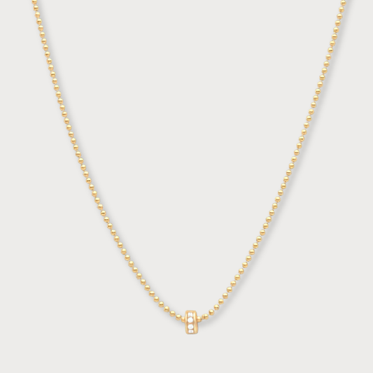 Aimée - goldfilled bolletjes collier met klein zirkonia wieltje