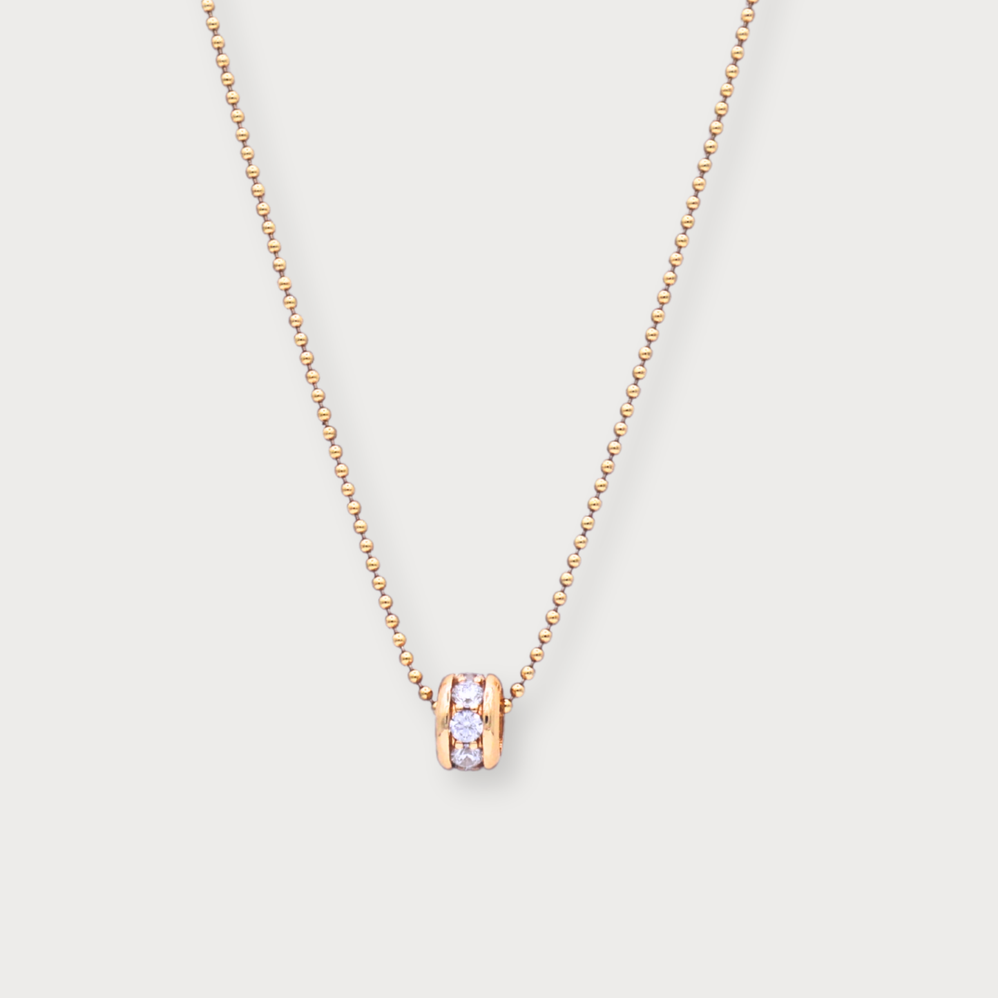 Féline - goldfilled bolletjes collier met 18-karaat goud verguld zirkonia wiel.